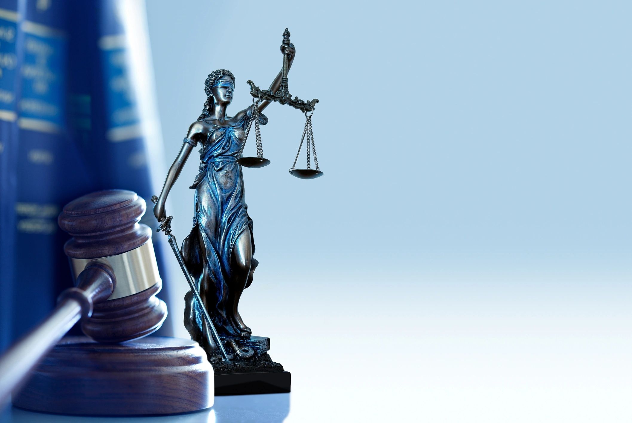 Gavel and law books on a desk